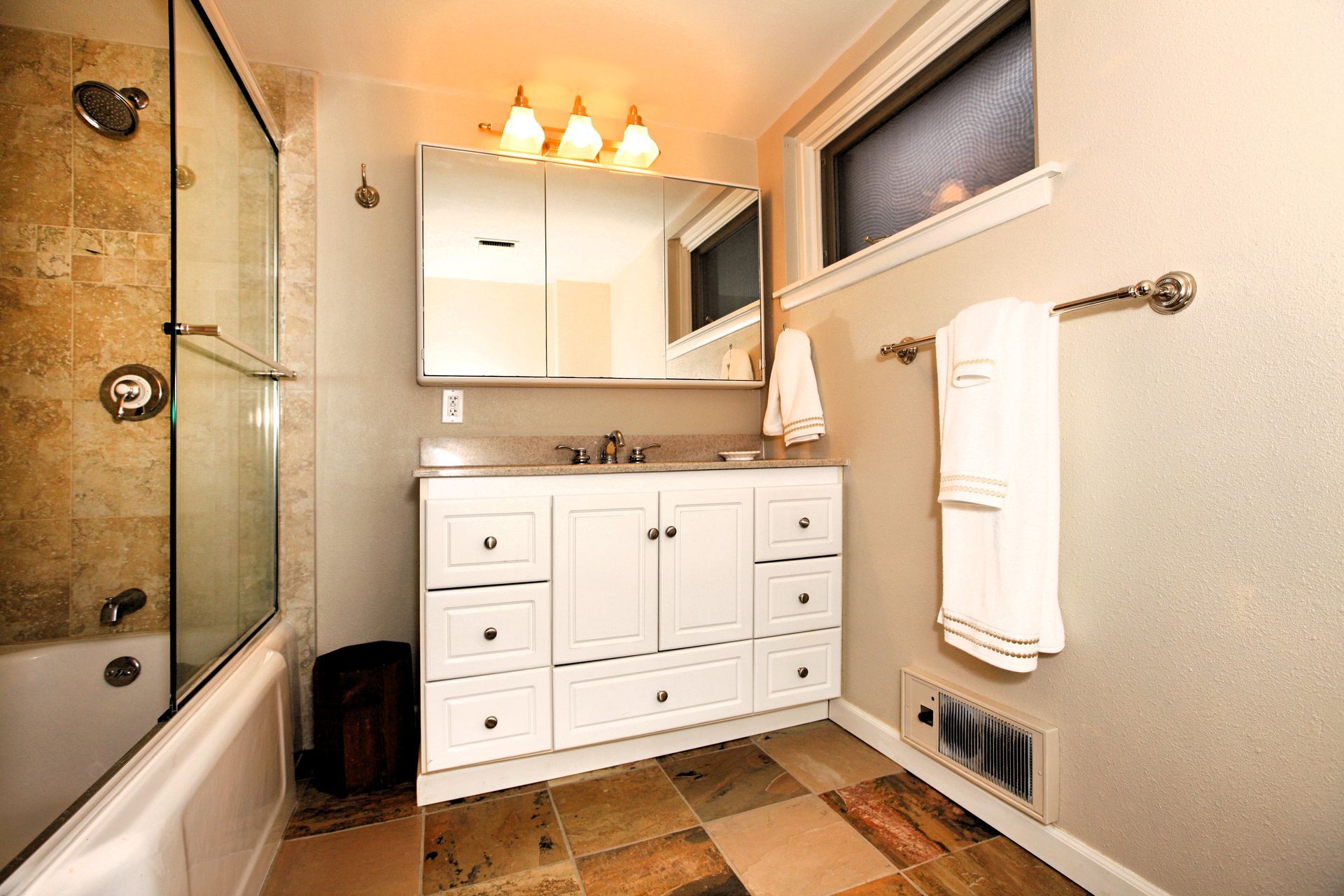 Modern white and beige basement bathroom makeover