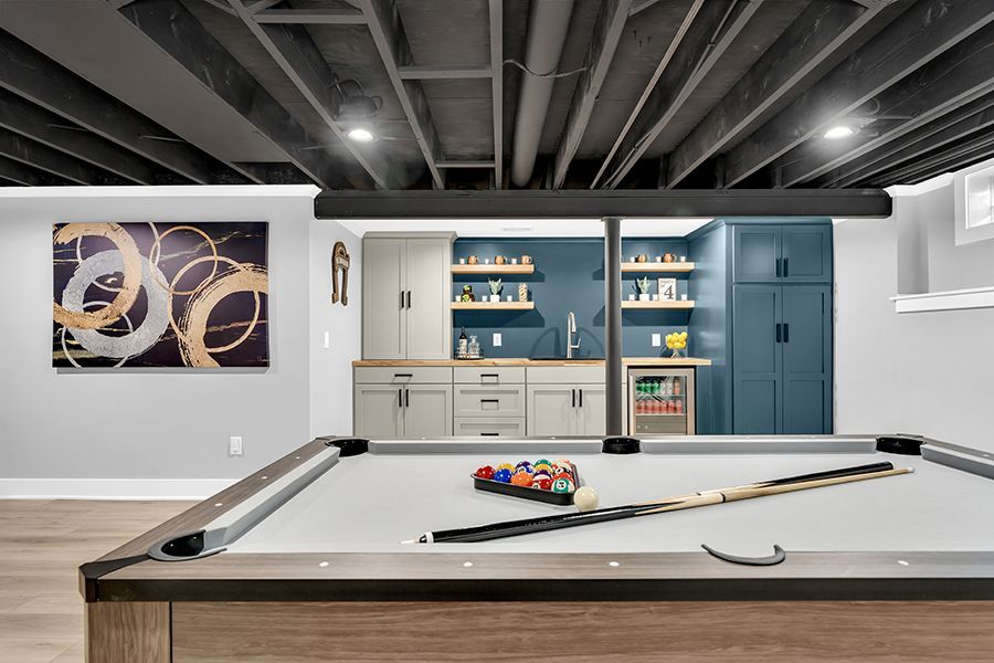 basement finished with kitchenette and rec room