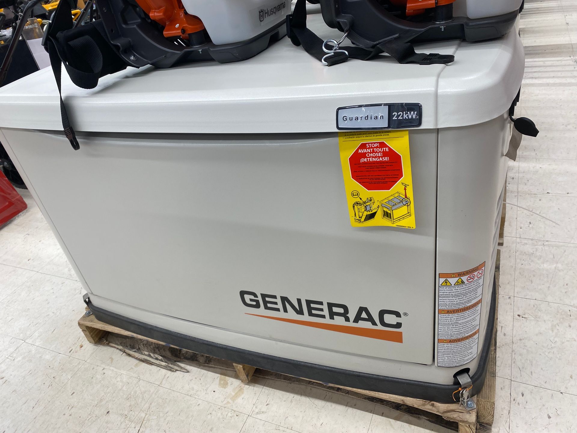 Generac generator on a pallet with a yellow 