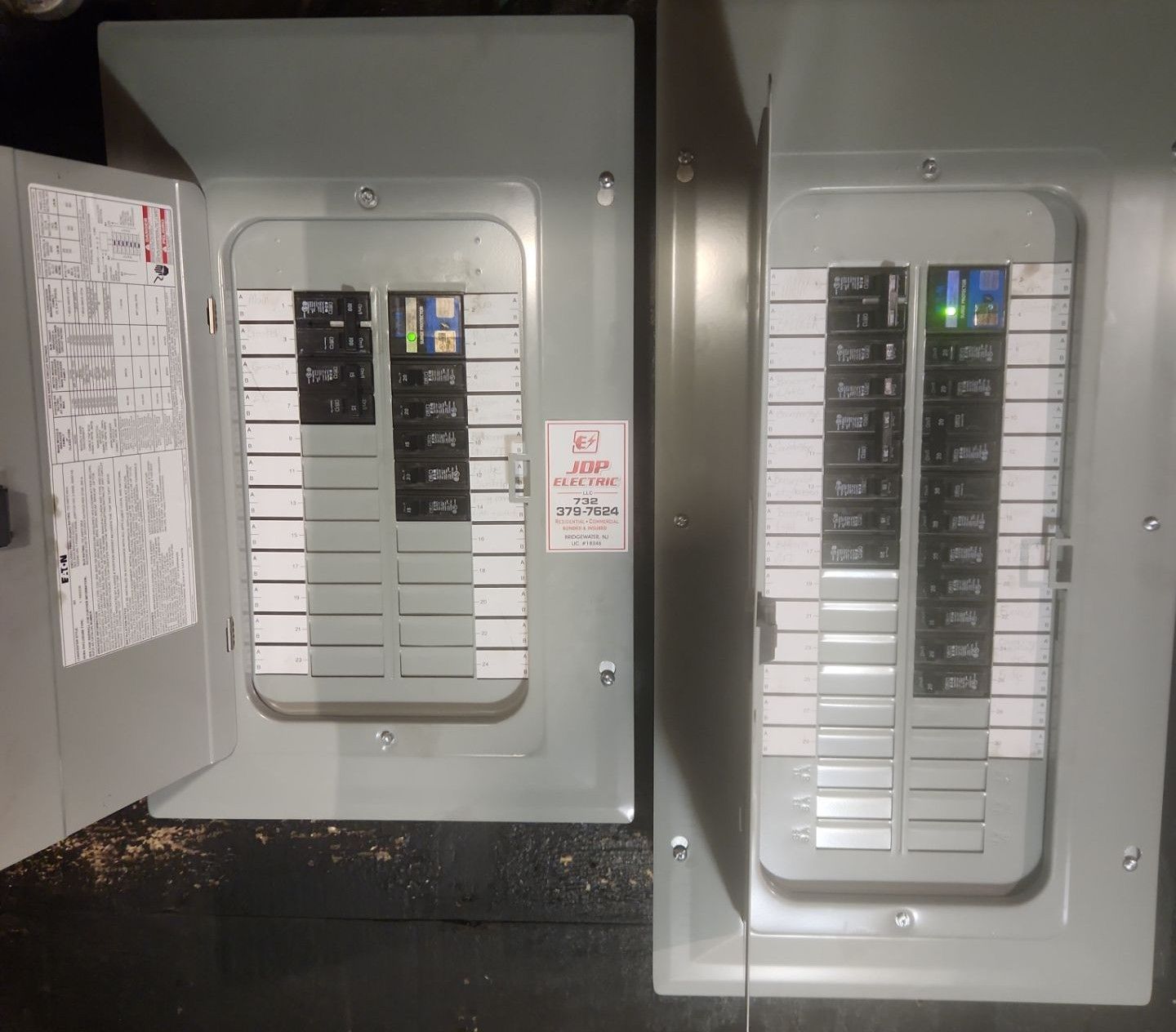 Electrician panel upgrade in Franklin Township NJ - two 100 amp breaker panels with new grounding system and surge protector