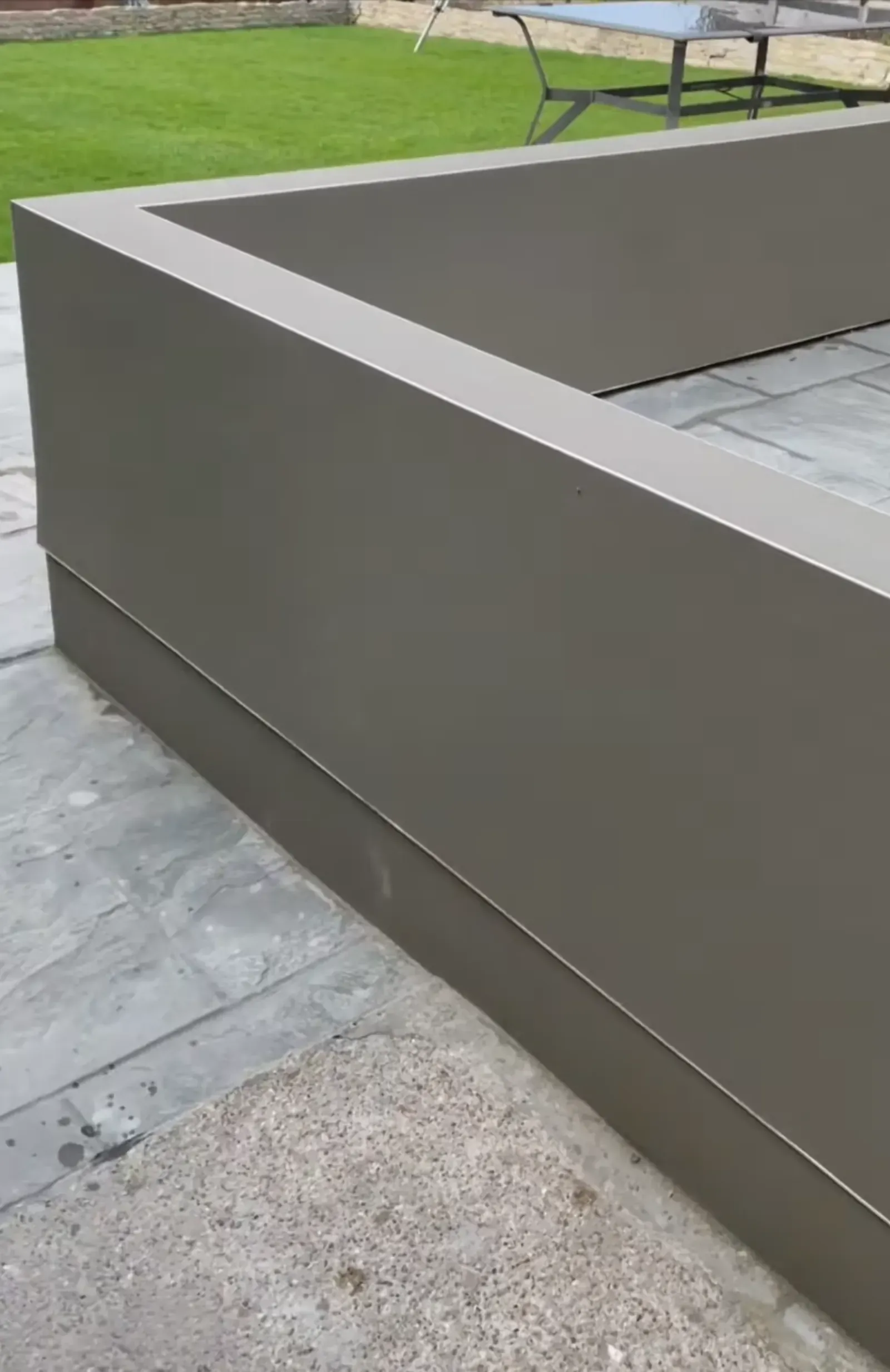 freshly installed sand and cement rendered garden wall
