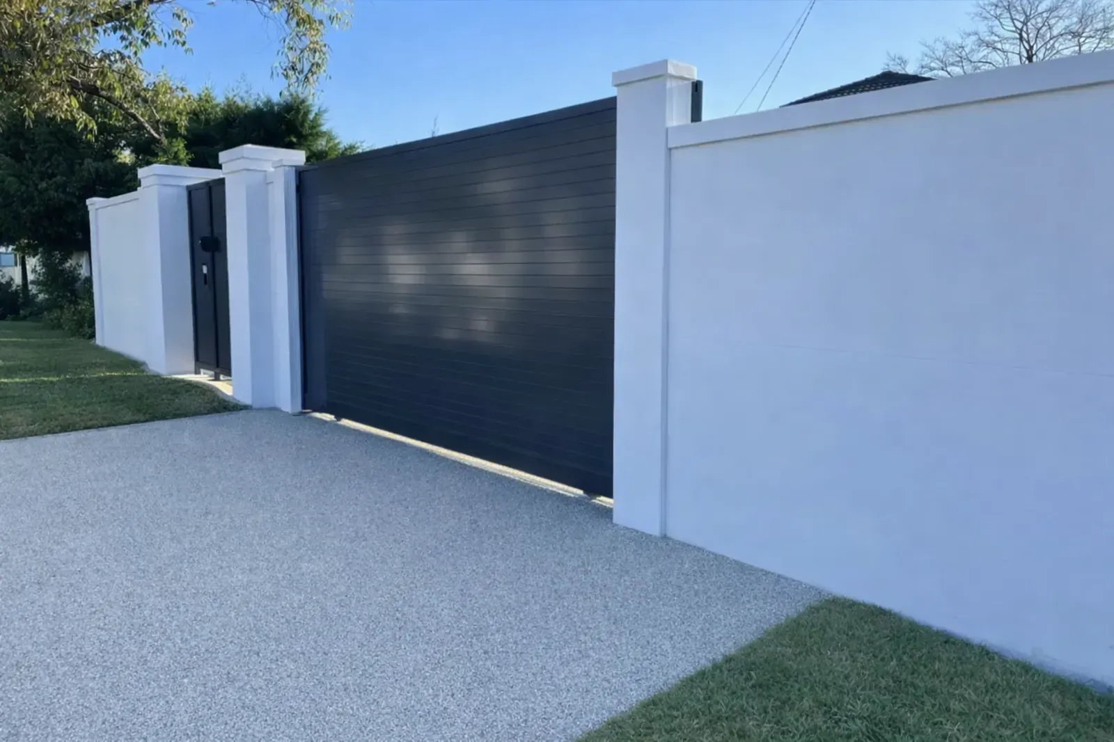 silicone rendered external wall with electric gate
