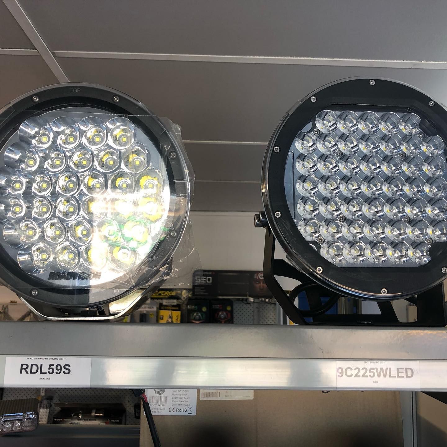 Two Round LED Light Fixtures Displayed on a Store Shelf — PowerMaster Batteries Moree in St, Moree, NSW