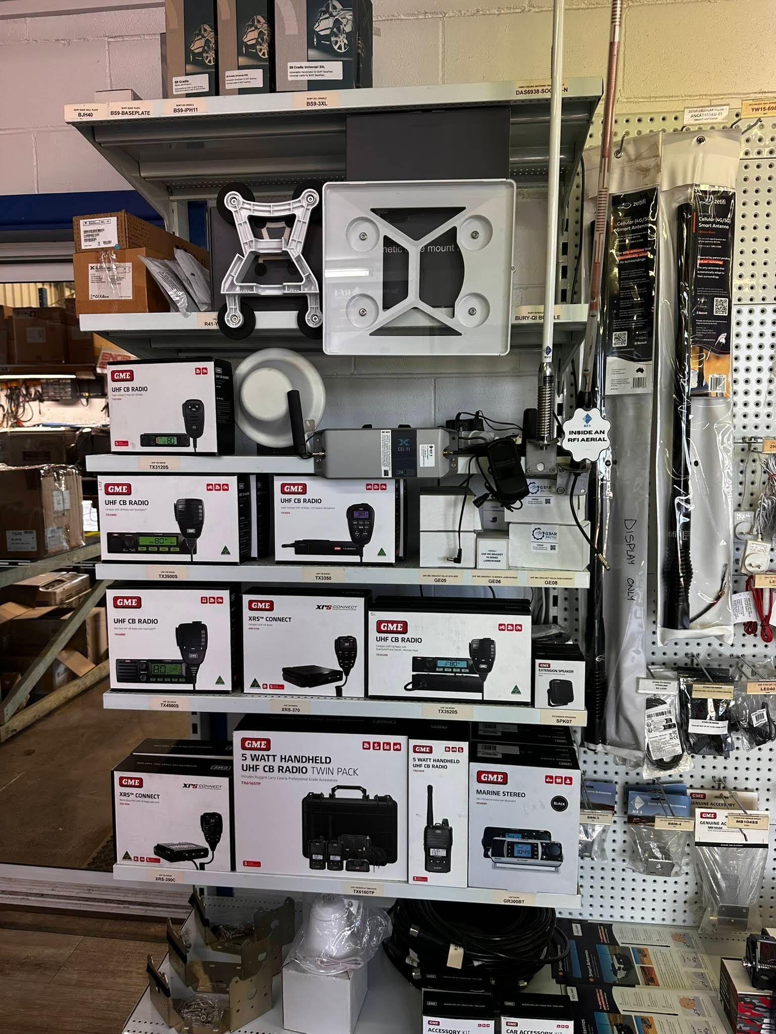 Retail Display of White and Black Accessories — PowerMaster Batteries Moree in St, Moree, NSW