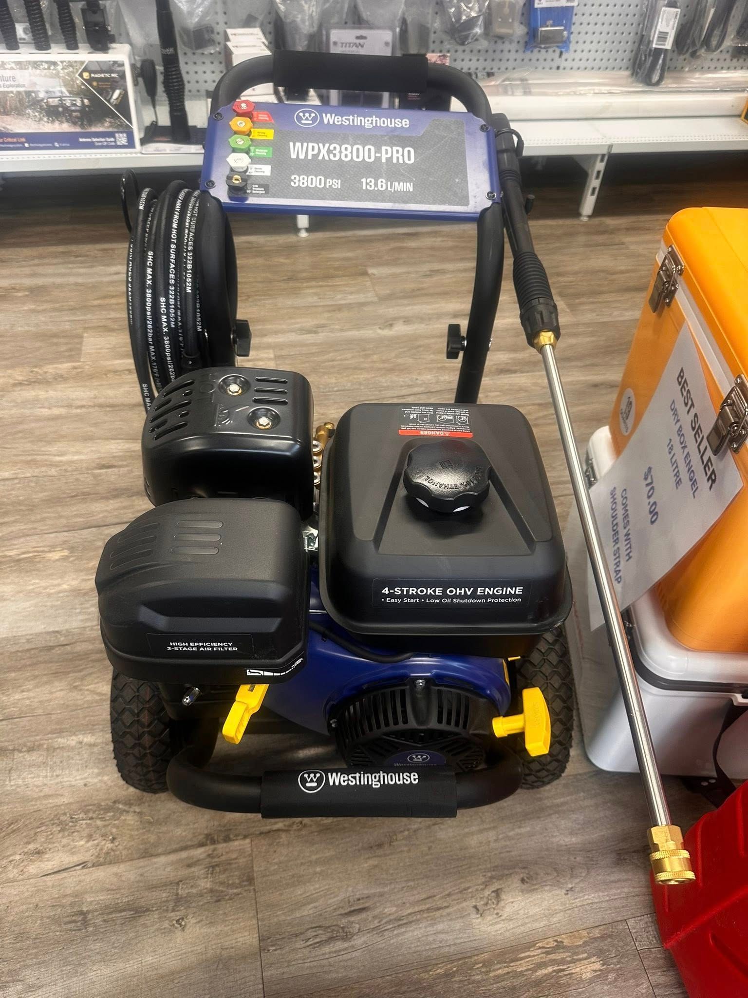 Three Pressure Washers and Accessories Displayed on a Floor in a Store Aisle — PowerMaster Batteries Moree in St, Moree, NSW