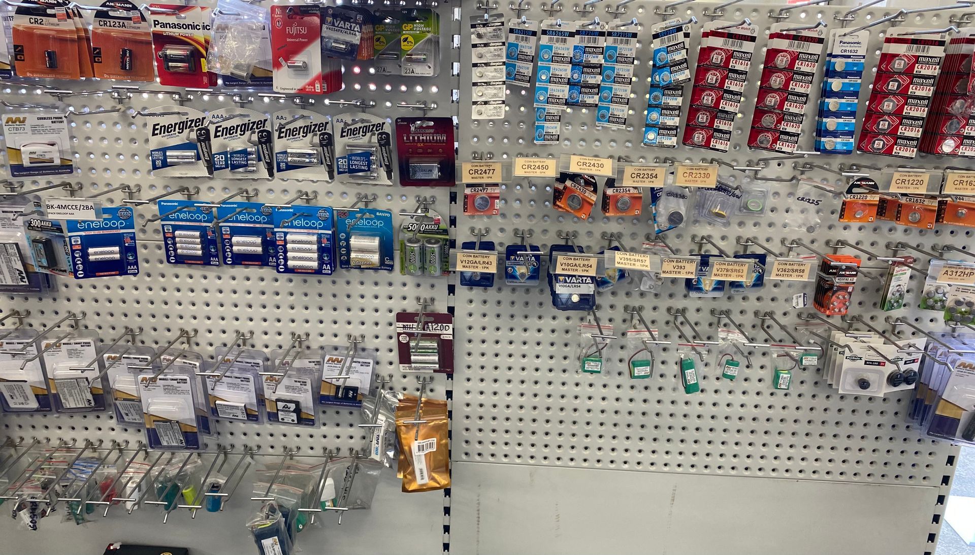 Store Display of Assorted Small Hardware Parts in Plastic Packages — PowerMaster Batteries Moree in St, Moree, NSW