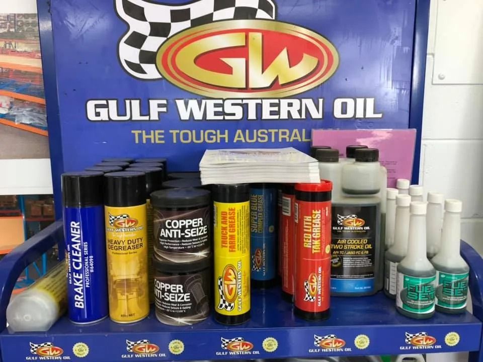 Gulf Western Oil display shelf with assorted automotive fluids and additives — PowerMaster Batteries Moree in St, Moree, NSW