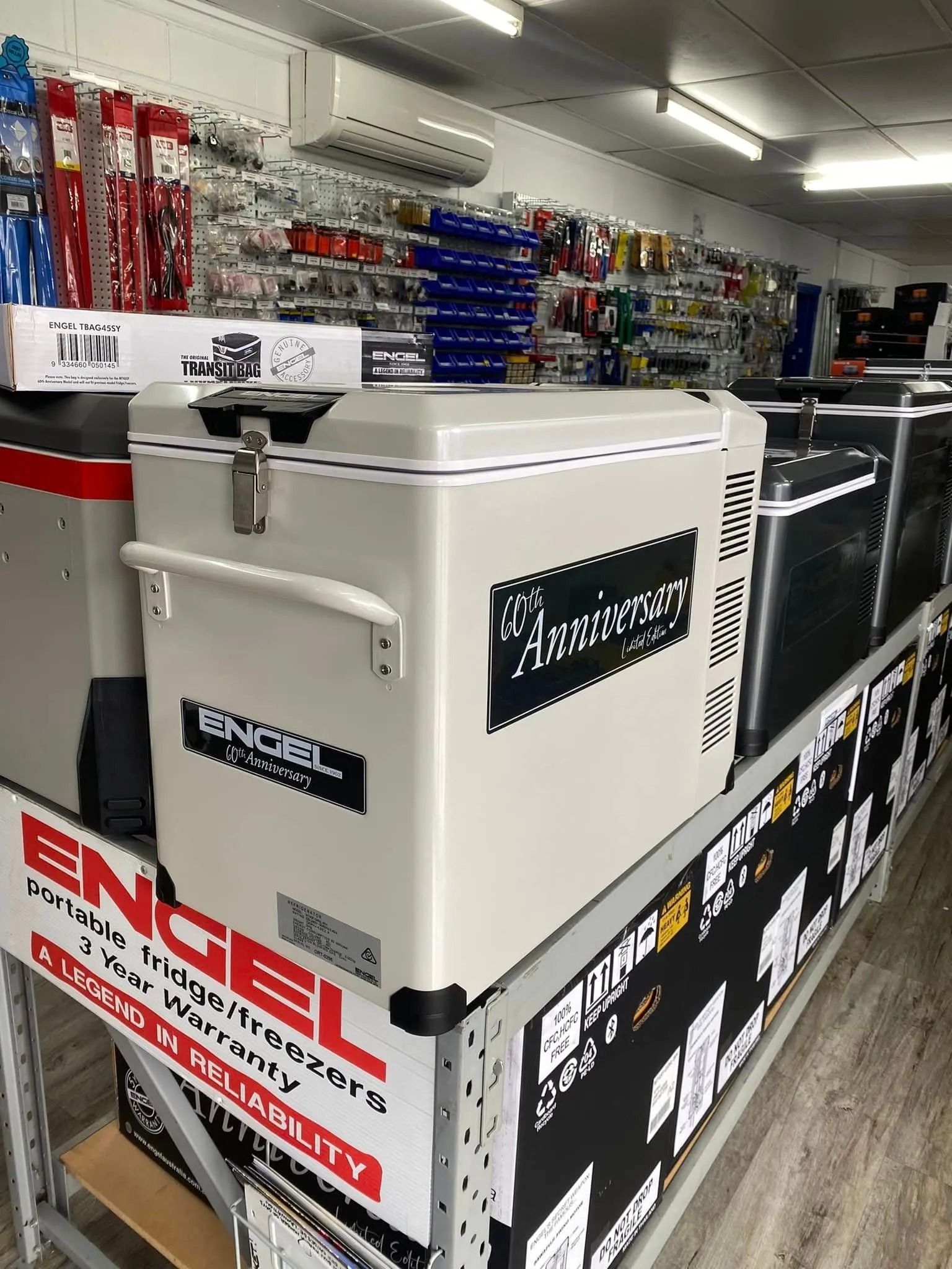 White Engel Cooler in a Store Aisle With Fishing Gear Displayed on Shelves — PowerMaster Batteries Moree in St, Moree, NSW