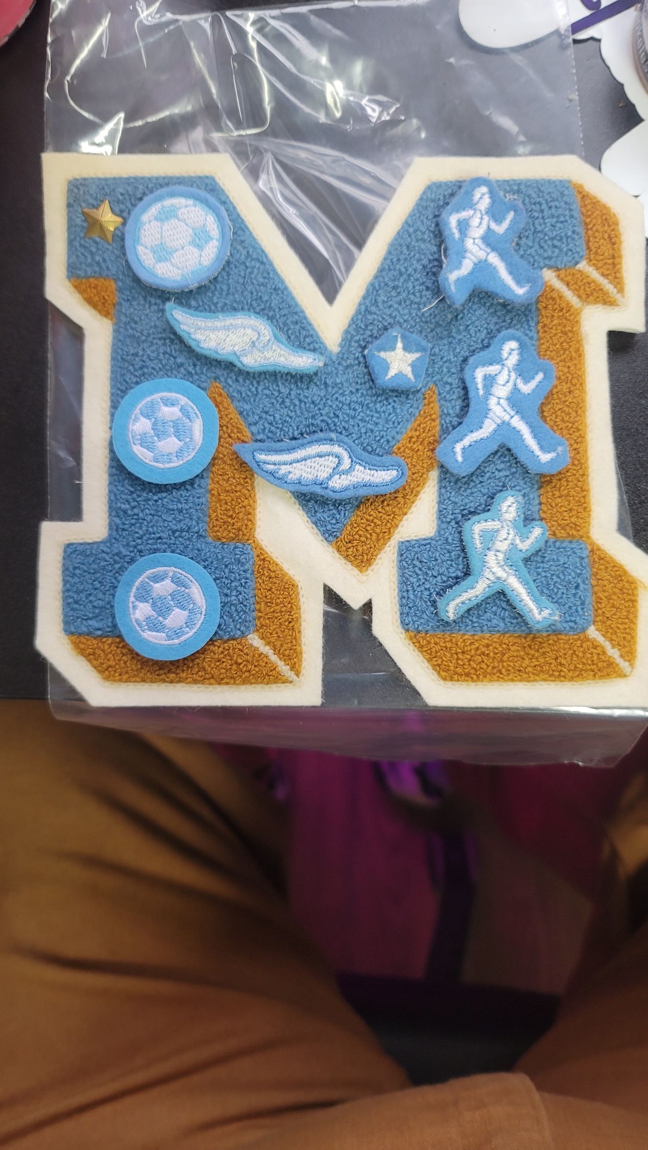 Baseball varsity jacket with Eagles lettering across back