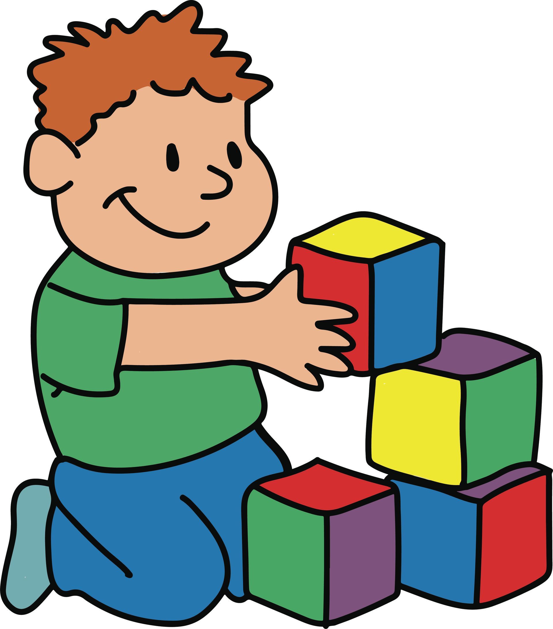 Child kneeling and stacking colorful blocks, smiling while building a tower