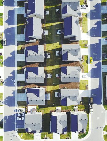 An aerial view of a residential area with lots of houses