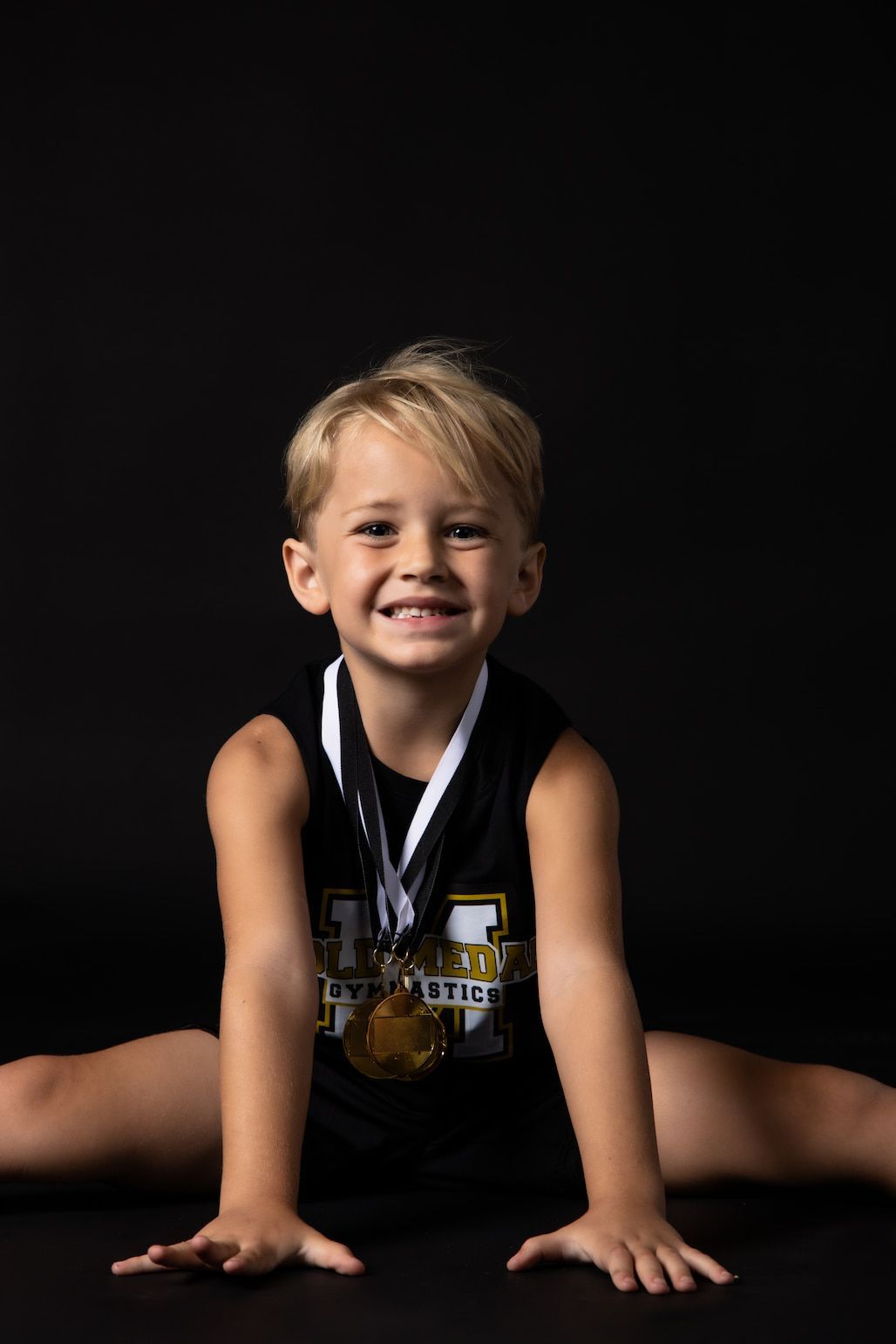 Gymnastic Boy Smiling In Front — Gold Medal Gymnastics In Molendinar, QLD