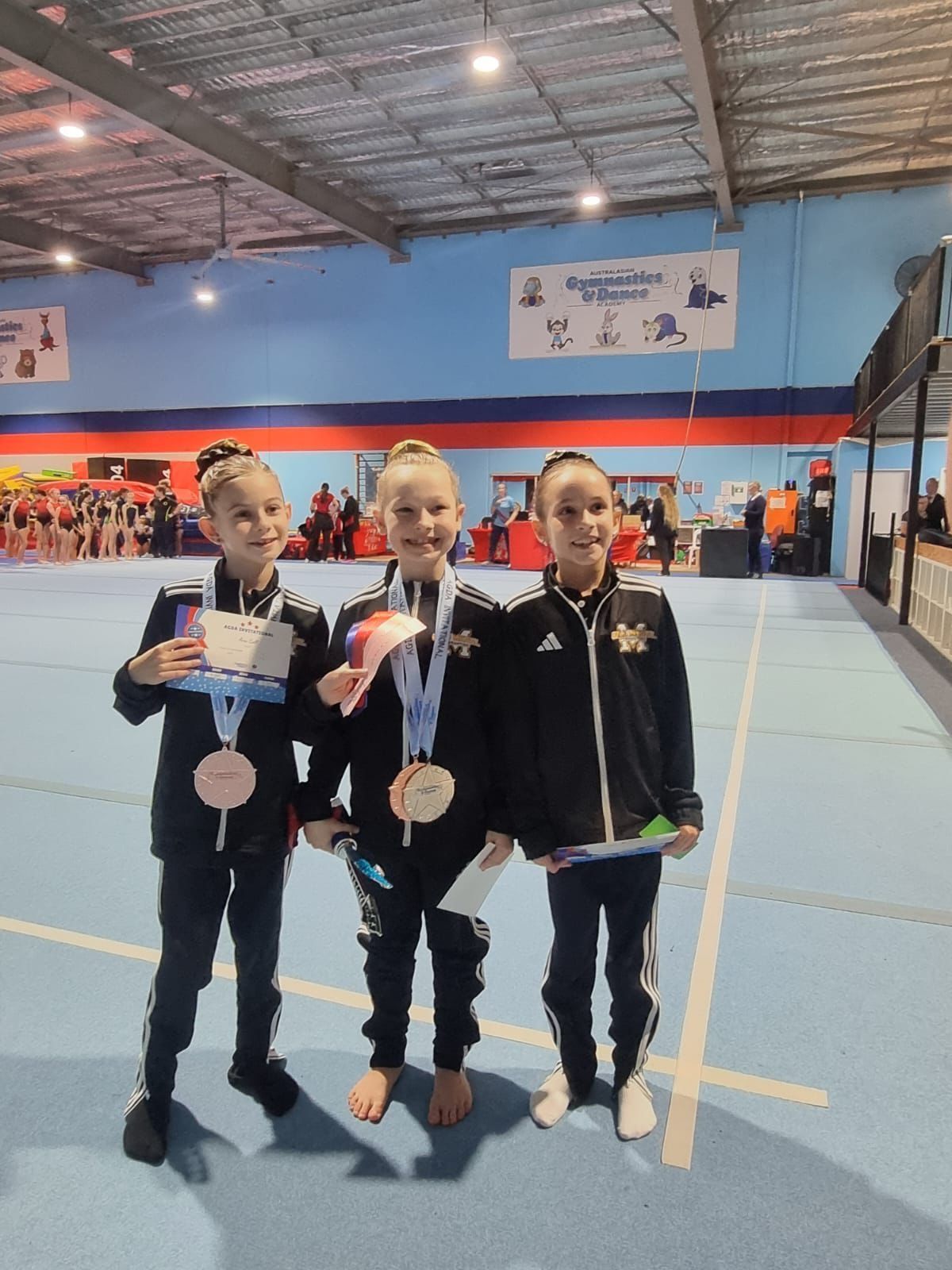 Youngs Girls Wearing Medal — Gold Medal Gymnastics In Molendinar, QLD