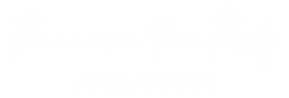 Mostly blank white image with a tiny dark speck near the top center