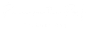 Mostly blank white image with a tiny dark speck near the top center