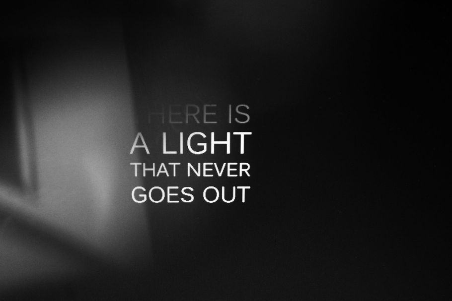 Dark abstract background with white text: 