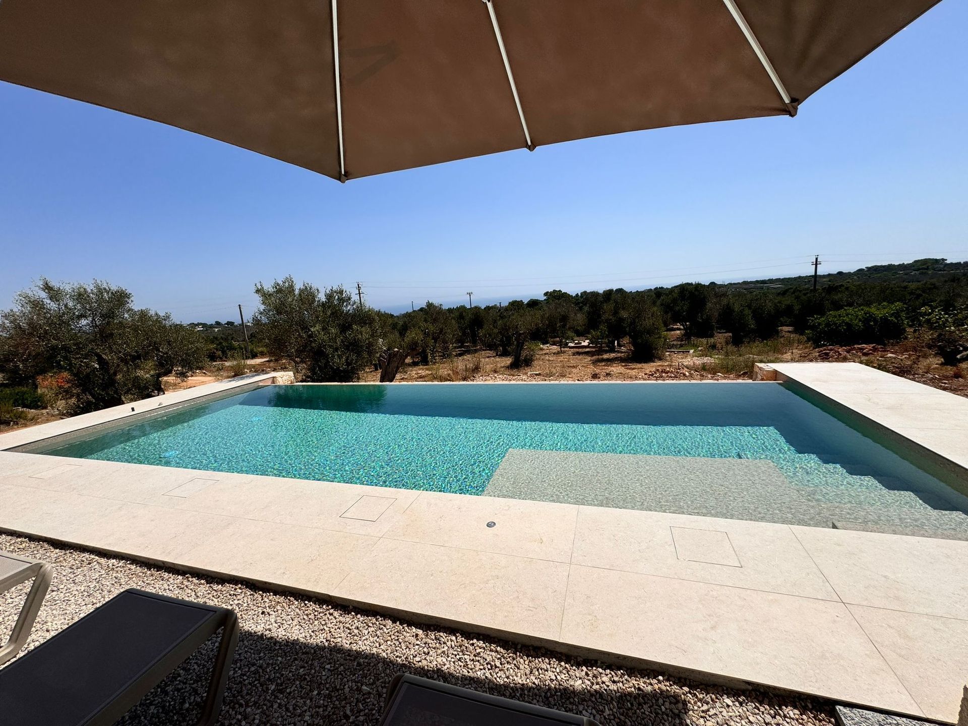 piscina fuoriterra infinity realizzata in provincia di lecce pescoluse pool design group