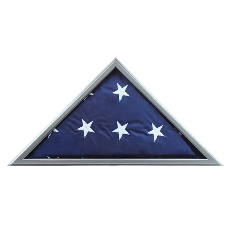 Folded American flag display in a triangular case with a blue field and white stars