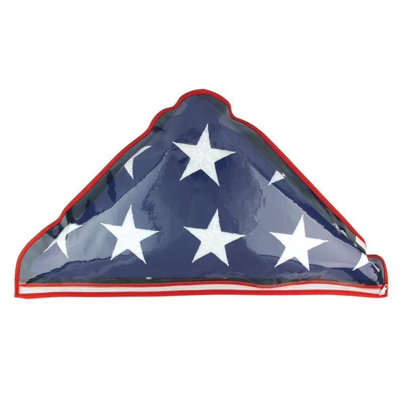 Folded blue cloth with white stars and a red outline, resembling a folded American flag or bandana.