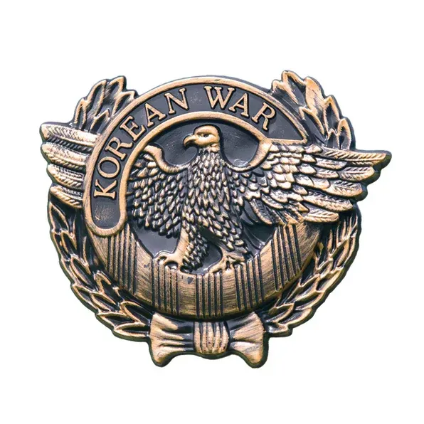 Korean War commemorative medal with eagle and laurel wreath emblem on a white background