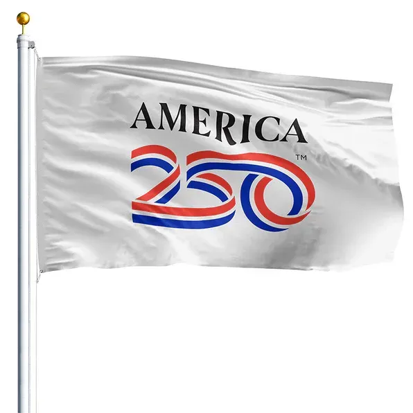 White flag with “AMERICA 250” in black and red-blue lettering, flying on a pole.
