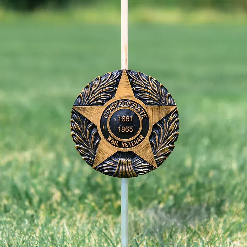 Confederate Veterans star medal with gold and black laurel design, dated 1861–1865
