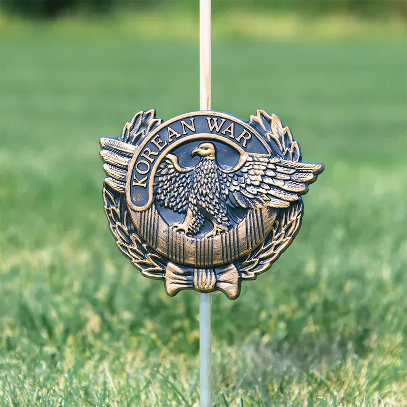 Korean War commemorative medal with eagle and laurel wreath emblem on a white background