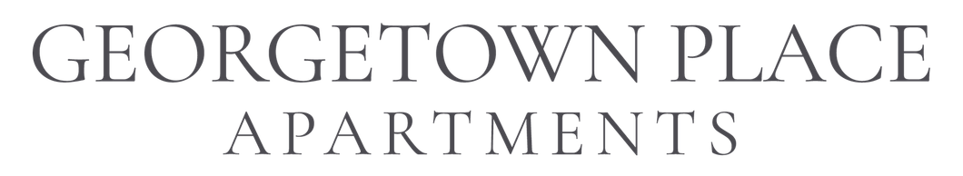 Mangrove Townhomes logo in dark blue serif text on a white background