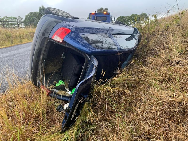A Car Has Fallen on Its Side on the Side of the Road — TNT Towing - Coffs Clarence in Woolgoolga, NSW