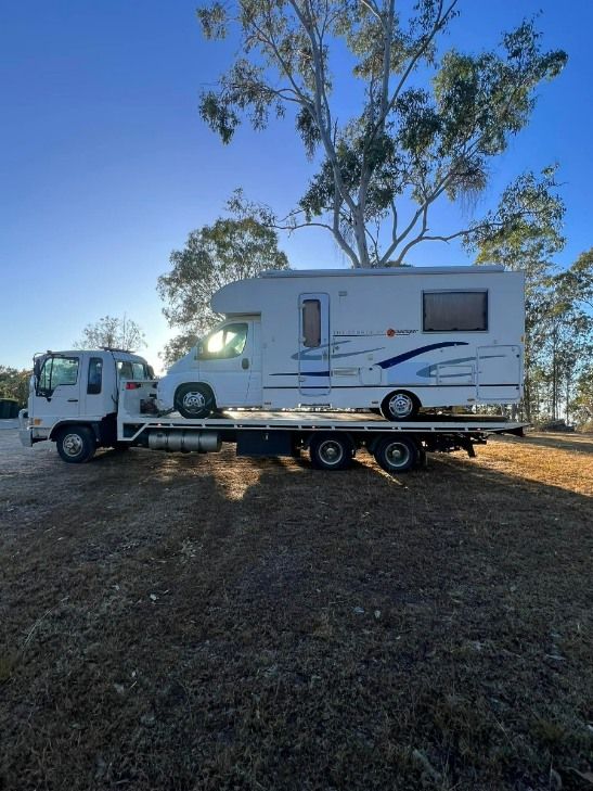 A RV is Being Towed by a Tow Truck — TNT Towing - Coffs Clarence in Coffs Harbour, NSW