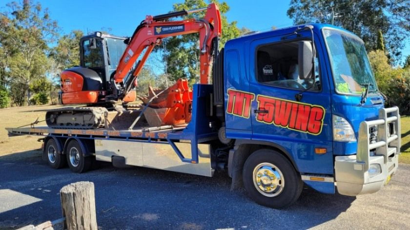 A Blue Tow Truck With the Word Towing on It — TNT Towing - Coffs Clarence in South Grafton, NSW