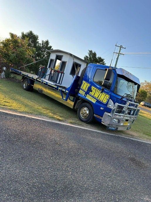 A Blue Tow Truck is Parked on the Side of the Road — TNT Towing - Coffs Clarence in Casino, NSW