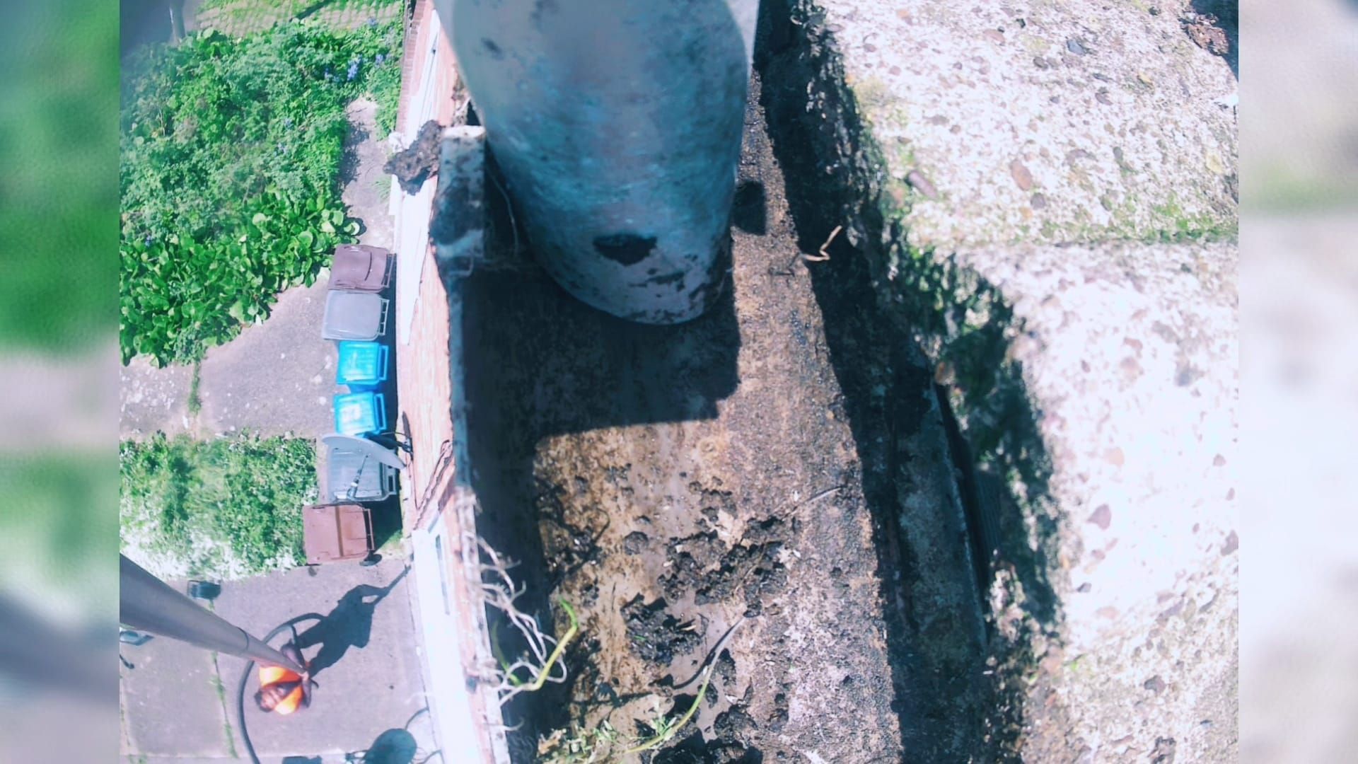 a gutter being cleaned
