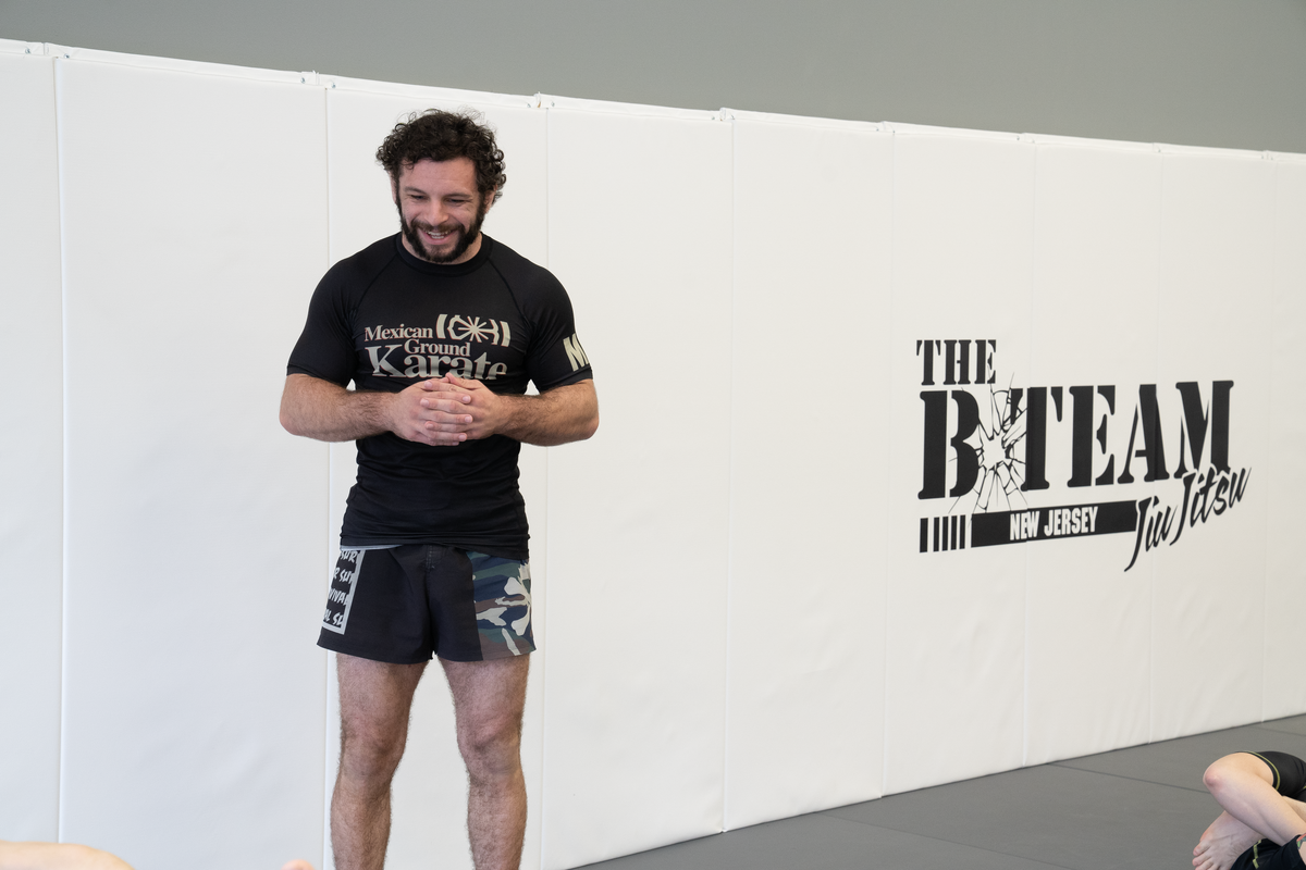 Adults training grappling and controlled breathing at All in Jiu-Jitsu in Green Brook, NJ.