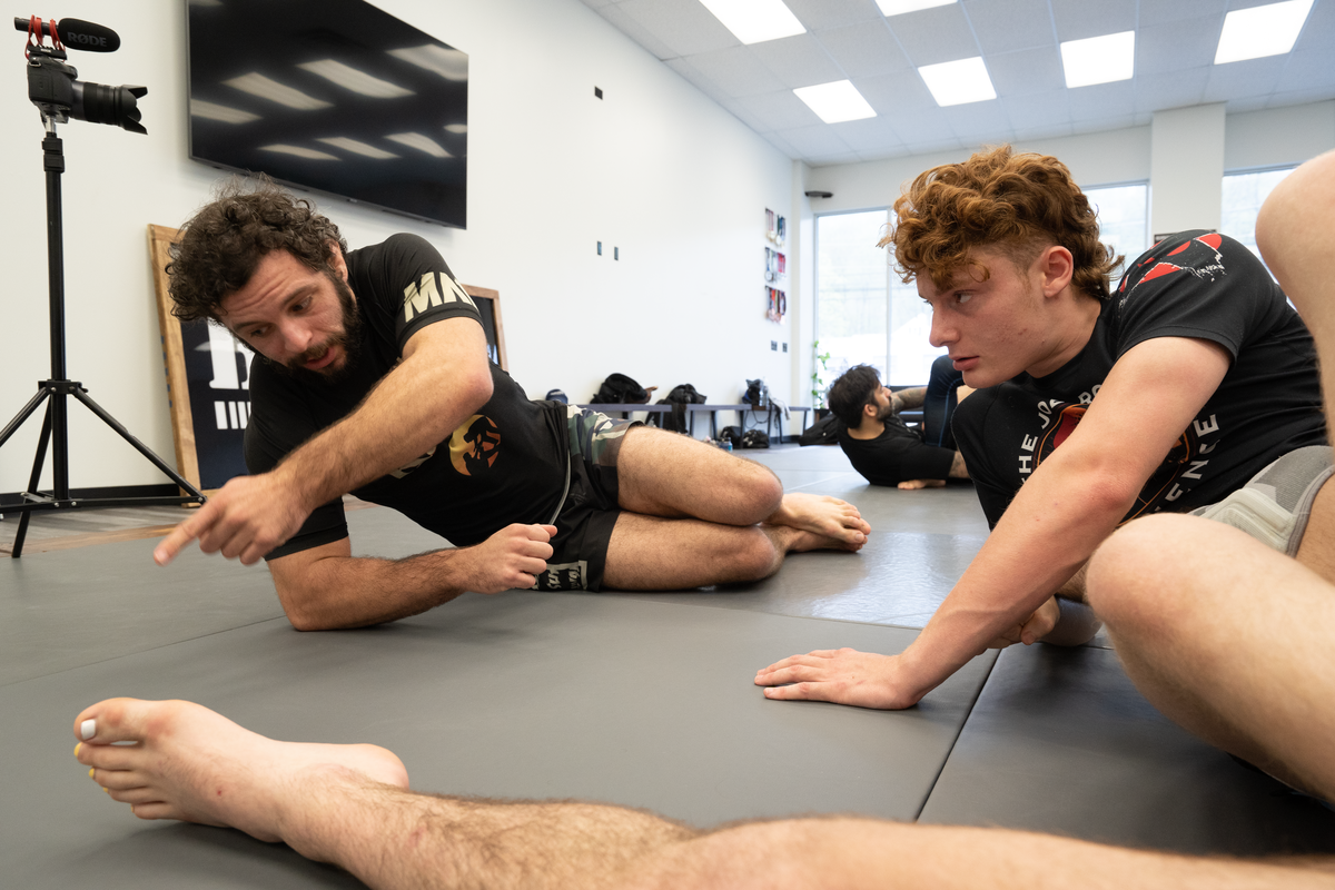 Adults practicing Jiu Jitsu at All in Jiu-Jitsu in Green Brook, NJ, building calm focus and stress relief.