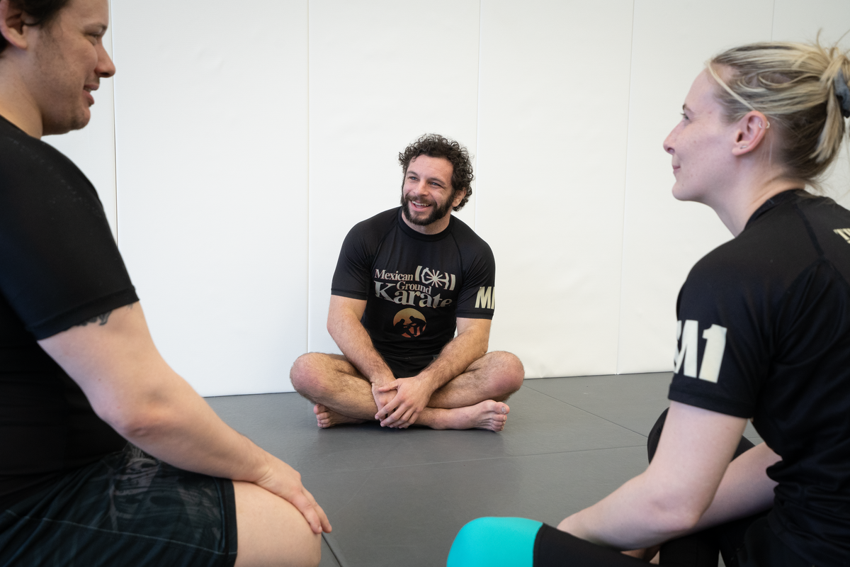 Adults drilling Jiu Jitsu technique at All in Jiu-Jitsu in Green Brook, NJ to build focus.