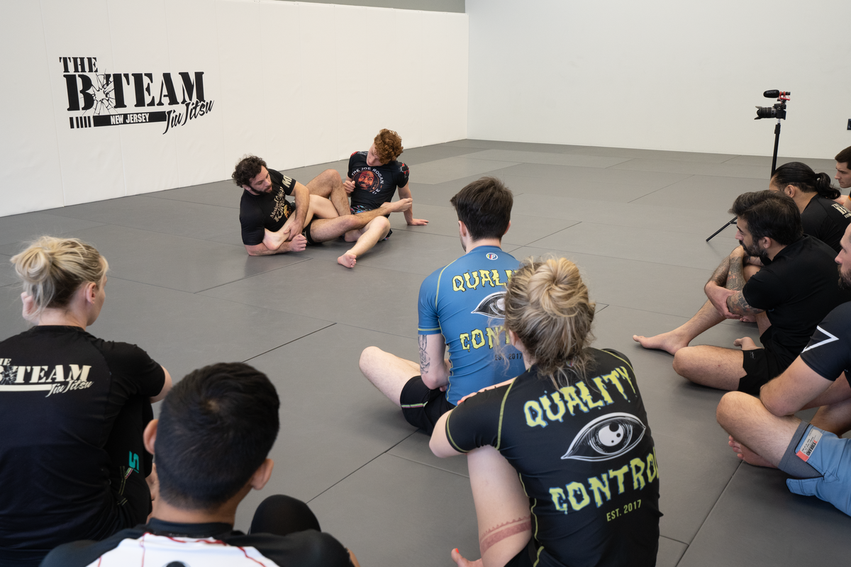 Students drilling Jiu Jitsu control positions at All in Jiu-Jitsu in Green Brook, NJ for practical self-defense.