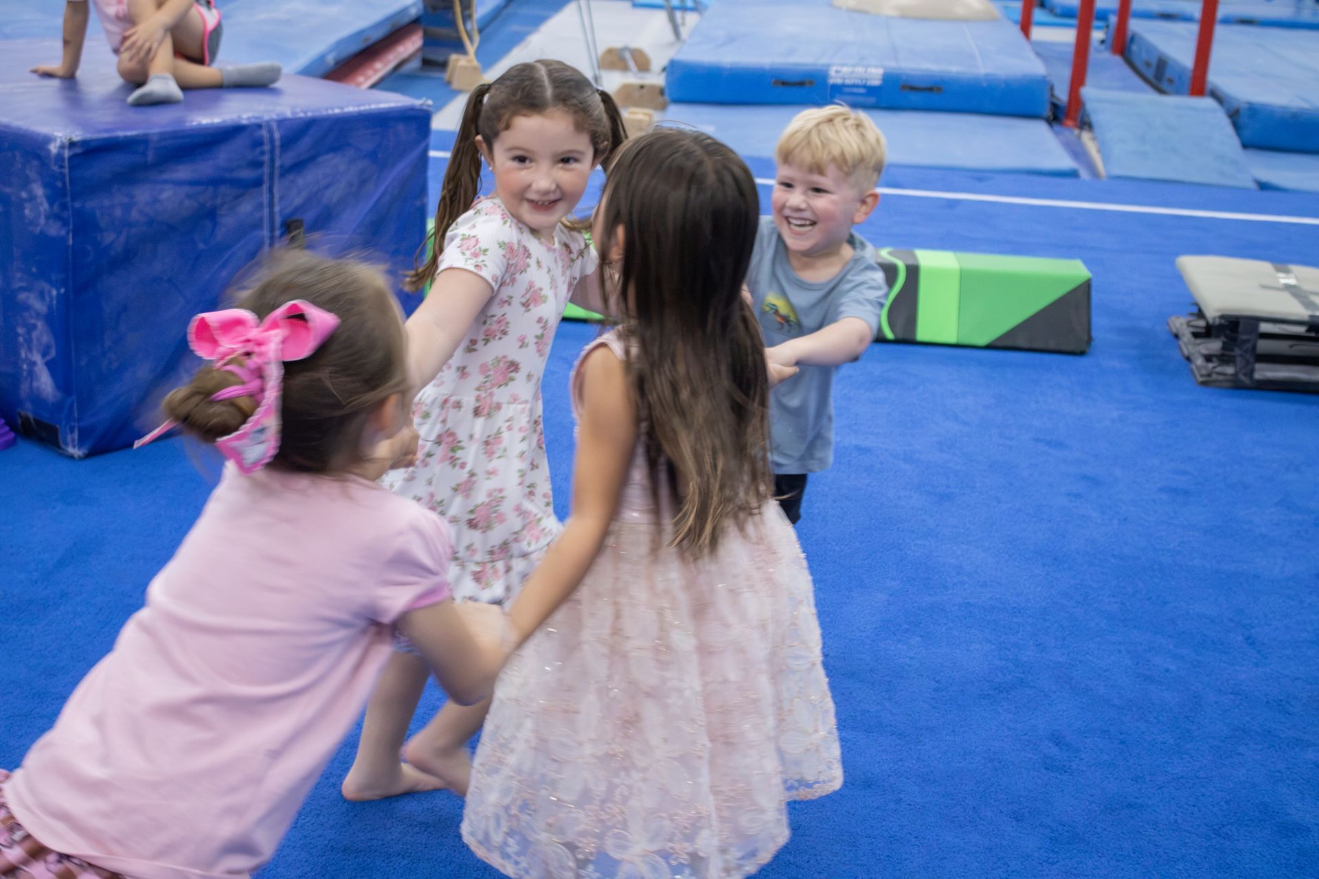 Children playing together during Morning Movers at HPGA