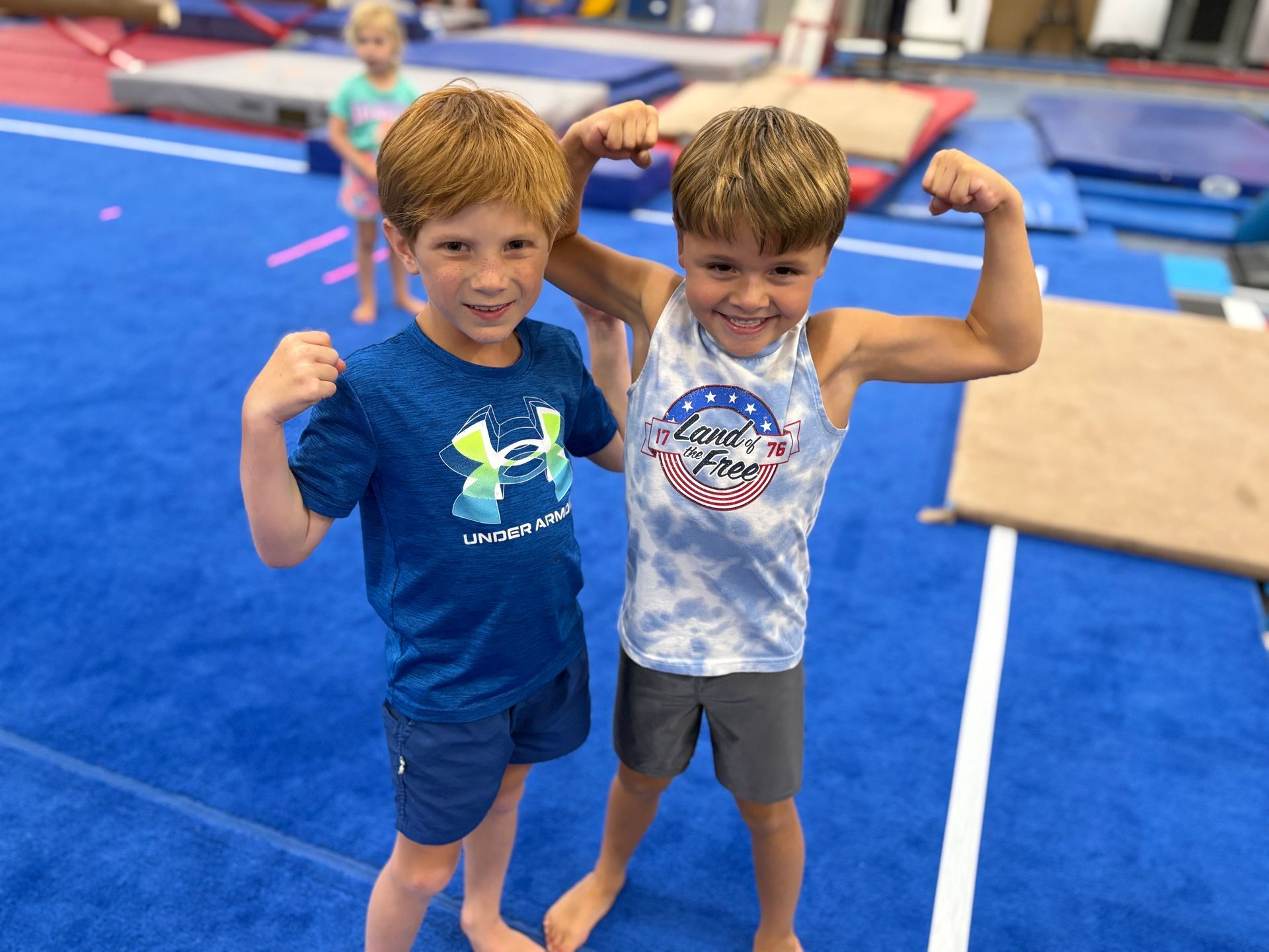 High Point Ninja athletes flexing their muscles