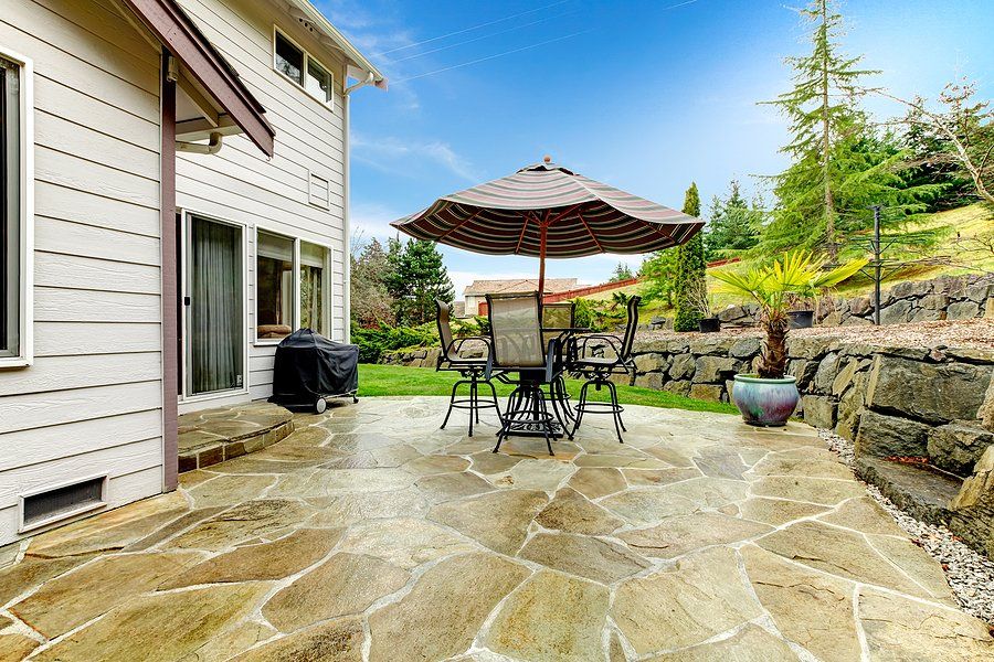 a house with concrete patio