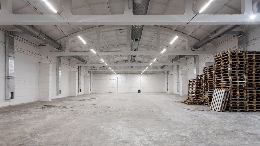 a storage area with pallets on the side