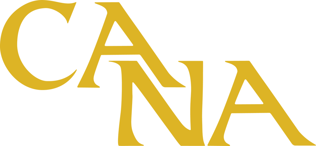 Gold stylized letters spelling “CANA” on a white background