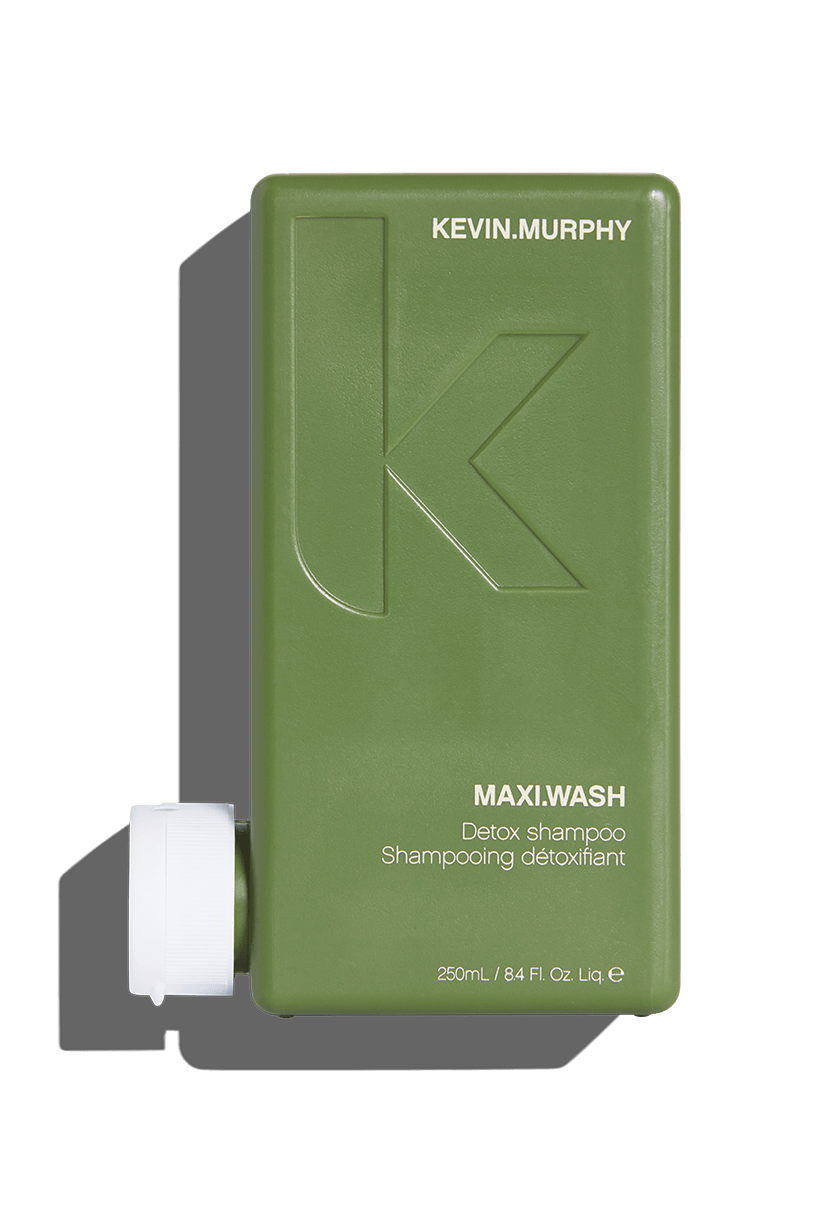 Olive-green Kevin Murphy Maxi Wash shampoo bottle with white dispenser.