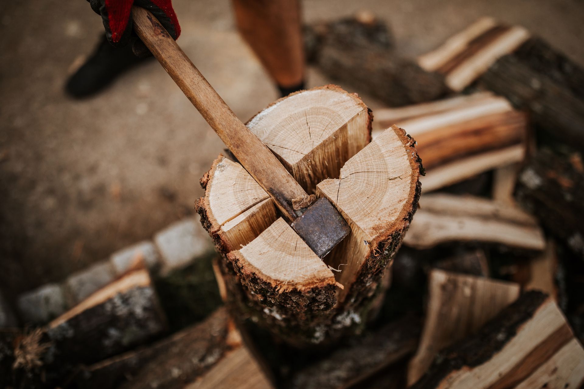 Splitting wood with axe