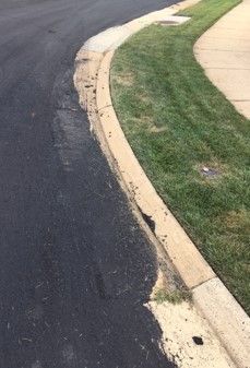 slurry seal blowout into gutterpan