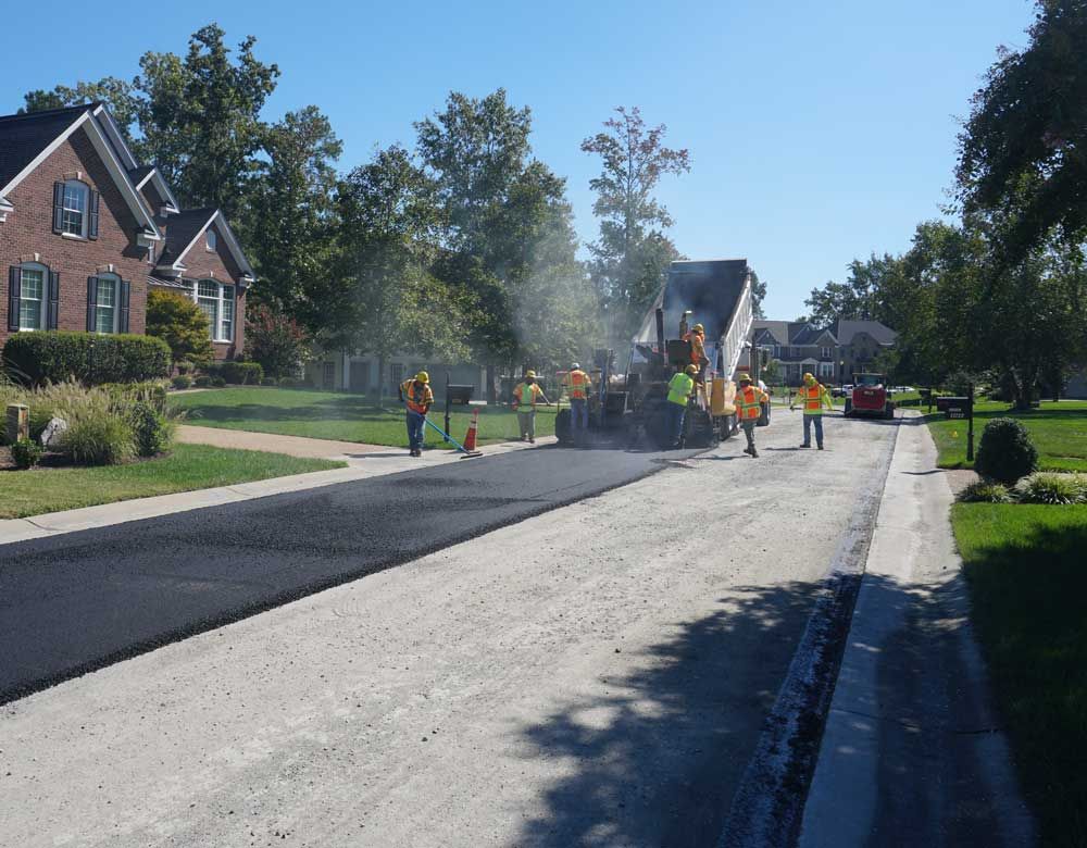 resurfacing road with plant mix asphalt