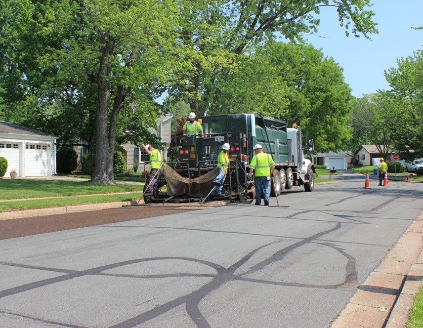resurfacing road with slurry seal