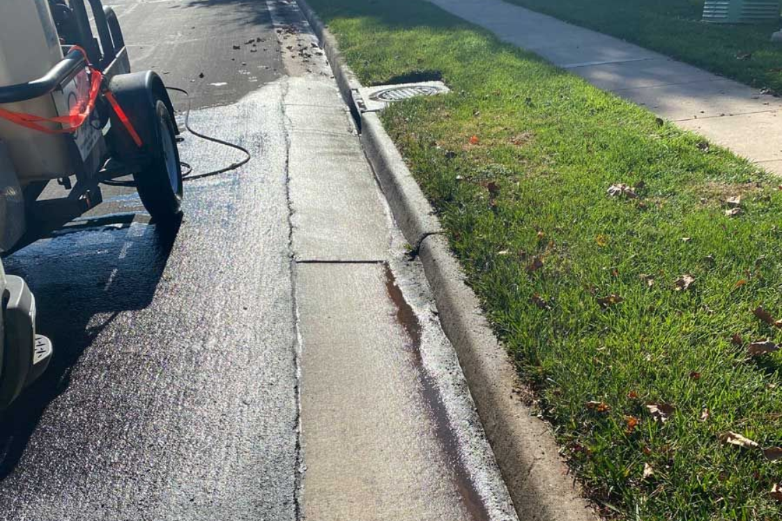 Power washing curbline