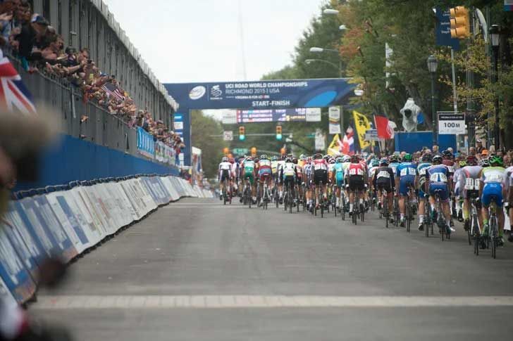 UCI bike race contestants riding on slurry seal surface