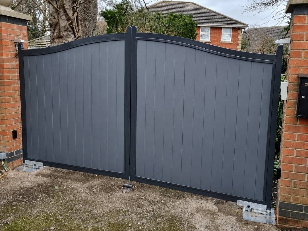 Arched composite electric gates